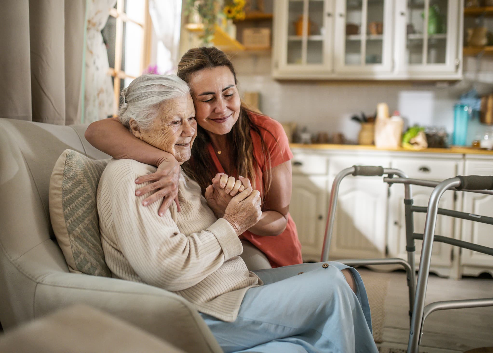 Caregiver assisting elderly client